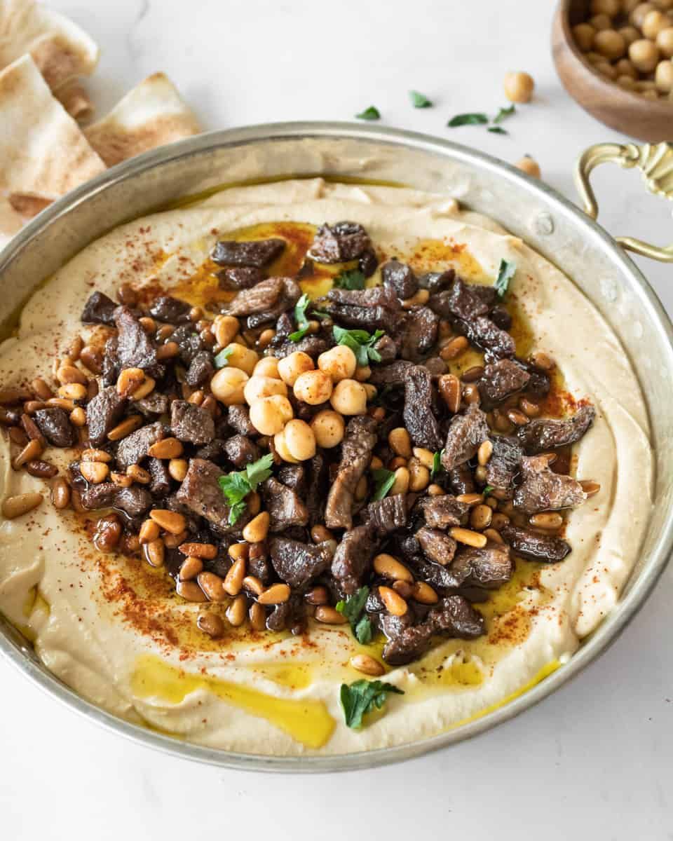 Hummus bil Lahme (Hummus With Spiced Meat And Pine Nuts)