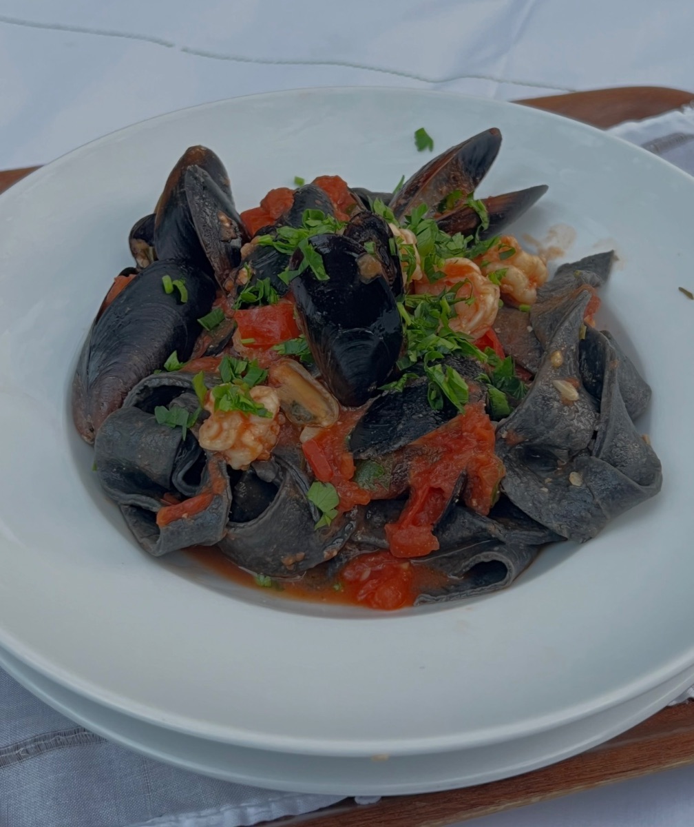 Squid Ink Pasta With Seafood And Tomato Sauce